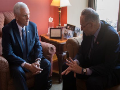 Vice President-elect Mike Pence meets with Senator Chuck Schumer (R), D-New York, in his office on Capitol Hill in Washington, DC, November 17, 2016. / AFP / JIM WATSON (Photo credit should read JIM WATSON/AFP via Getty Images)