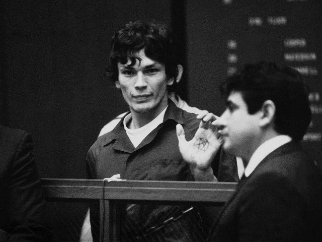 FILE-This 1985 file photo shows Richard Ramirez, center, know as the Night Stalker shows a