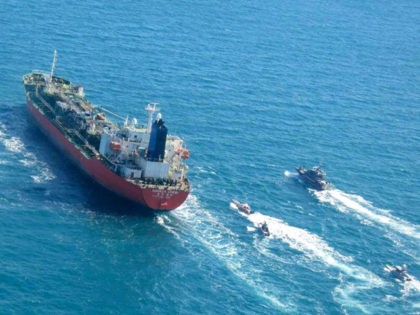 A picture obtained by AFP from the Iranian news agency Tasnim on January 4, 2021, shows the South Korean-flagged tanker being escorted by Iran's Revolutionary Guards navy after being seized in the Gulf. - "A Korean ship was seized in Persian Gulf waters by the Revolutionary Guard's navy and transferred …