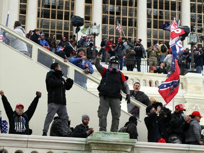 WASHINGTON, DC – JANUARY 06: Protesters gather outside the U.S. Capitol Building on Janu