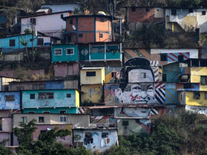 A mural depicting Venezuelan late leader Hugo Chavez is seen at Guarataro slum in Caracas,