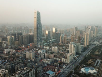 WUHAN, CHINA - JANUARY 28: An aerial view of the city sunset on January 28, 2021 in Wuhan, China. In order to curb the spread of the new crown pneumonia COVID-19 disease, the Chinese government closed the city of Wuhan for 76 days starting January 23, 2020. (Photo by Lintao …