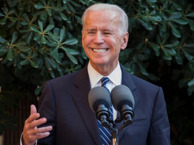 US Vice President Joe Biden smiles as he speaks at Ledra palace in the UN-patrolled Buffer Zone in Nicosia on May 22, 2014. Biden met Cyprus leaders Thursday to spur talks on ending the island's 40-year division and seek support for threatened sanctions against Russia despite the economic cost. AFP …