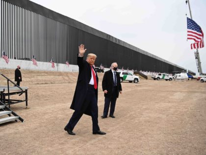TOPSHOT - US President Donald Trump waves after speaking and touring a section of the border wall in Alamo, Texas on January 12, 2021. (Photo by MANDEL NGAN / AFP) (Photo by MANDEL NGAN/AFP via Getty Images)