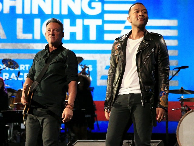 LOS ANGELES, CA - NOVEMBER 18: Recording artists Bruce Springsteen (L) and John Legend perform onstage at A+E Networks "Shining A Light" concert at The Shrine Auditorium on November 18, 2015 in Los Angeles, California. (Photo by Christopher Polk/Getty Images for A+E Networks)