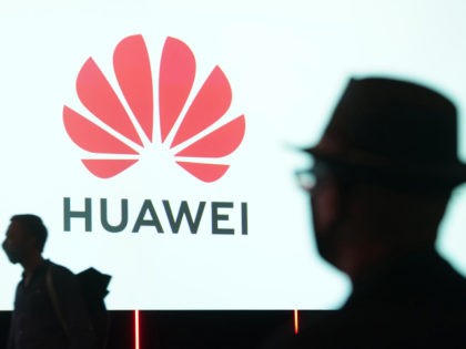 BERLIN, GERMANY - SEPTEMBER 03: People arrive to attend the Huawei keynote address at the