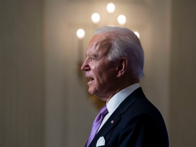 WASHINGTON, DC - JANUARY 26: U.S. President Joe Biden speaks about the coronavirus pandemic in the State Dining Room of the White House on January 26, 2021 in Washington, DC. President Biden said his administration has secured commitments from vaccine makers Pfizer and Moderna to purchase another 200 million doses …