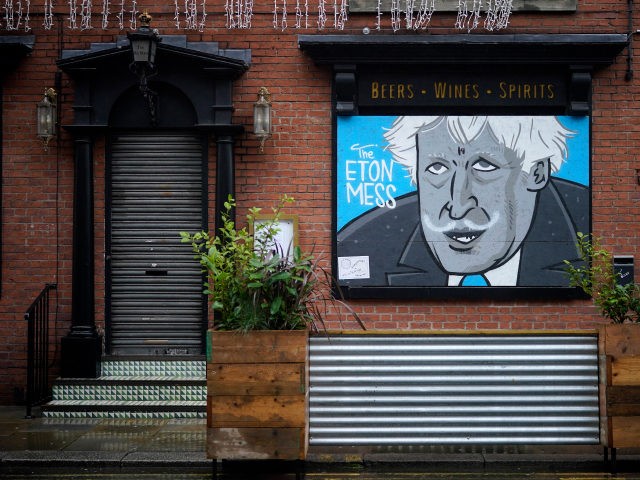 MANCHESTER, UNITED KINGDOM - JANUARY 13: Political graffiti mocking British Prime Minister