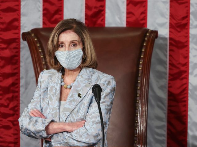 TOPSHOT - Speaker of the House Nancy Pelosi (D-CA) waits during votes in the first session