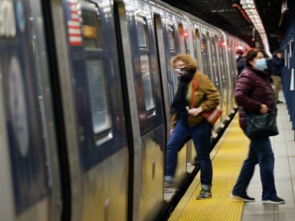 A subway arrives at a Brooklyn station on November 18, 2020 in New York City. In a bid to