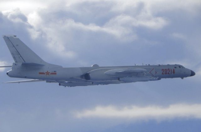 In this photo released by the Taiwan Ministry of National Defense, a Chinese People's Liberation Army H-6 bomber is seen flying near the Taiwan air defense identification zone, ADIZ, near Taiwan on Friday, Sept. 18, 2020. The second high-level U.S. envoy to visit Taiwan in two months began a day …