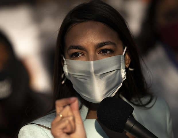 In this November 19, 2020 file photo, Rep. Alexandria Ocasio-Cortez (D-NY) speaks outside