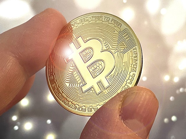 Photo by: STRF/STAR MAX/IPx 2021 2/14/21 Bitcoin nears $50,000 as it reaches new record on Sunday, rising above $49,000 for the first time.