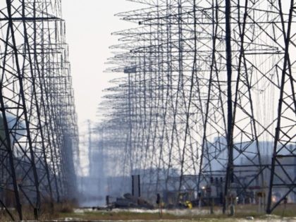 Power lines are shown Tuesday, Feb. 16, 2021, in Houston. More than 4 million people in Texas still had no power a full day after historic snowfall and single-digit temperatures created a surge of demand for electricity to warm up homes unaccustomed to such extreme lows, buckling the state's power …