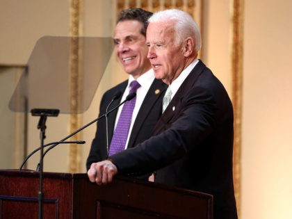 NEW YORK, NY - MARCH 16: Governor of New York State Andrew Cuomo (L) and 47th Vice President of the United States Joe Biden speak on stage at the HELP USA 30th Anniversary Event at The Plaza Hotel on March 16, 2017 in New York City. (Photo by Monica Schipper/Getty …