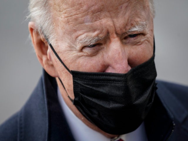 U.S. President Joe Biden stops to briefly speak with reporters on his way to Marine One on