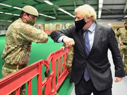 GLASGOW, SCOTLAND - JANUARY 28: British Prime Minister Boris Johnson meets troops as they