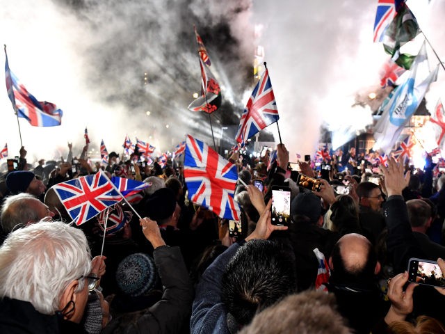 LONDON, ENGLAND - JANUARY 31: Pro Brexit supporters celebrates as the United Kingdom exits the EU during the Brexit Day Celebration Party hosted by Leave Means Leave at Parliament Square on January 31, 2020 in London, England. At 11.00pm on Friday 31st January the UK and Northern Ireland exits the …