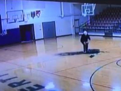 custodian shoots basketball