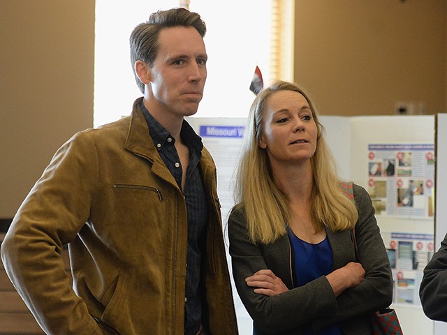 COLUMBIA, MO - NOVEMBER 06: Missouri's Republican U.S. Senate Candidate Josh Hawley waits in line with his wife, Erin Hawley, to casts their votes on election day at The Crossings Church on November 6, 2018 in Columbia, Missouri. Hawley, the current Missouri Attorney General, is hoping to unseat current Democratic incumbent Senator Claire McCaskill. (Photo by Michael Thomas/Getty Images)