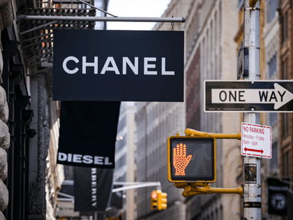 Signage for a Chanel store hangs in the SoHo neighborhood of Manhattan, February 19, 2019 in New York City. Karl Lagerfeld, a prolific and influential German fashion designer, passed away on Tuesday in Paris at the age of 85.(Photo by Drew Angerer/Getty Images)
