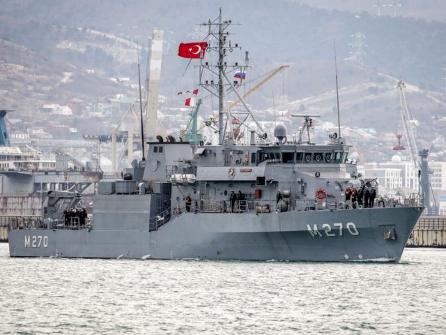 The minesweeper Akcay of the Naval Forces of Turkey enters the harbour of the Russian port of Novorossiysk on March 6, 2019. - Two Turkish warships minesweeper Akcay and corvette Burgazada participate in "The Blue Motherland - 2019" military exercises in the Black sea. (Photo by STR / AFP) (Photo …