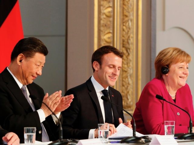 (From L) Chinese President Xi Jinping, French President Emmanuel Macron and German Chancellor Angela Merkel hold a press conference at the Elysee presidential palace in Paris, on March 26, 2019. - Xi Jinping meets with the leaders of France, Germany and the European Commission, as European countries seek to boost …