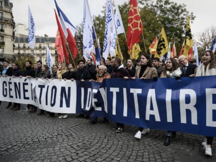 Protesters walk in the street during a demonstration against islamism organised by the far right group Generation Identitaire (GI) in Paris on November 17, 2019. (Photo by Philippe LOPEZ / AFP) (Photo by PHILIPPE LOPEZ/AFP via Getty Images)