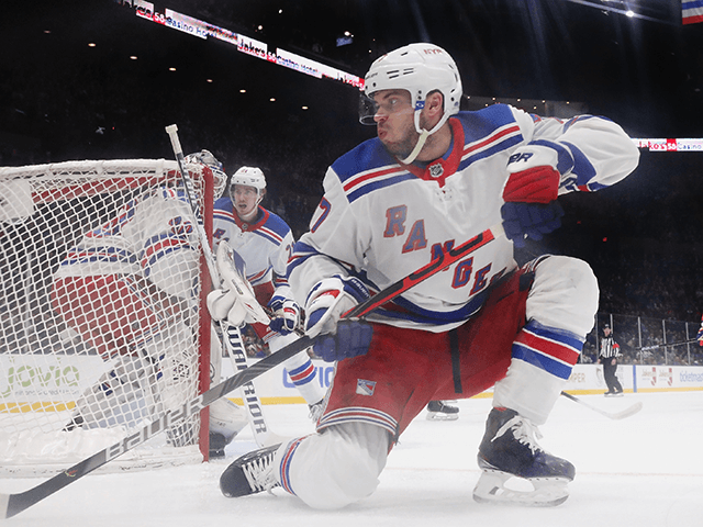 Tony DeAngelo #77 of the New York Rangers skates against the New York Islanders at NYCB Live's Nassau Coliseum on February 25, 2020 in Uniondale, New York. The Rangers defeated the Islanders 4-3 in overtime. (Photo by Bruce Bennett/Getty Images)