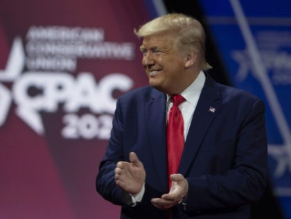 NATIONAL HARBOR, MARYLAND - FEBRUARY 29: US President Donald Trump acknowledges the crowd