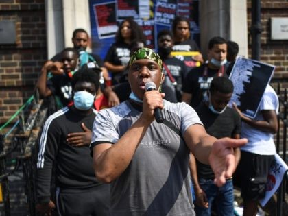 LONDON, ENGLAND - AUGUST 08: Protesters gather outside Tottenham Police station on August 8, 2020 in London, England. The protest was held to demand changes in the police force including an end to 'overpolicing of Black communities' and the use of excessive force and tasers. It marks the anniversary of …