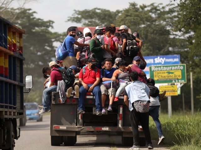 SAN PEDRO SULA, HONDURAS - JANUARY 15: Truckers serve as transportation for the migrants who go in the caravan, facilitating their arrival at the Honduran border with Guatemala and thus being able to reach the United States informacion especifica on January 14, 2021 in San Pedro Sula, Honduras. The caravan …