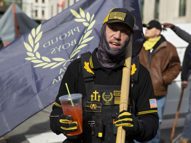 A member of the Proud Boys speaks to the media at a gun rights rally near the Capitol in Richmond, Virginia on January 18, 2021. - Pro-Trump protests planned at state capitols nationwide got off to a quiet start with only small groups of armed demonstrators gathering in states including …