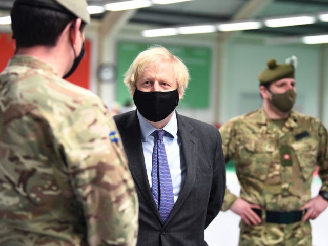 GLASGOW, SCOTLAND - JANUARY 28: British Prime Minister Boris Johnson meets troops as they