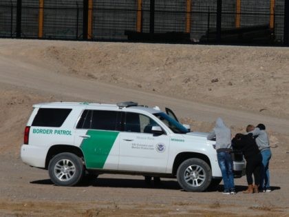 Central American migrants are detained by the border Patrol agents after crossing the Rio Bravo to get to El Paso, state of Texas, US, From Ciudad Juarez, Chihuahua state, Mexico on February 5, 2021. (Photo by Herika Martinez / AFP) (Photo by HERIKA MARTINEZ/AFP via Getty Images)