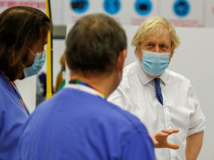 DERBY, ENGLAND - FEBRUARY 08: UK Prime Minister Boris Johnson visits a vaccination centre