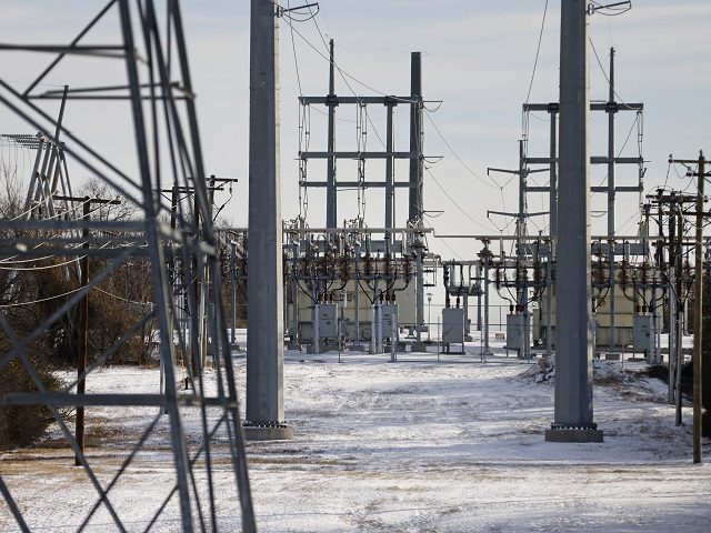 FORT WORTH, TX - FEBRUARY 16: Transmission towers and power lines lead to a substation after a snow storm on February 16, 2021 in Fort Worth, Texas. Winter storm Uri has brought historic cold weather and power outages to Texas as storms have swept across 26 states with a mix …