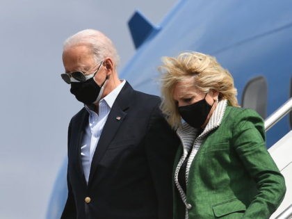 US President Joe Biden and First Lady Jill Biden step off Air Force One upon arrival at Ellington Field Joint Reserve Base in Houston, Texas on February 26, 2021. - Biden is visiting Houston, Texas following severe winter storms which left much of the state without electricity for days. (Photo …