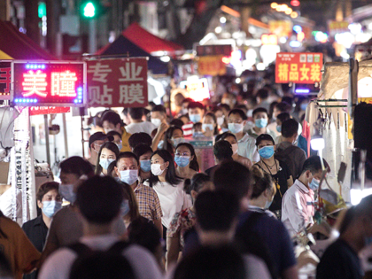 Residents visit a night market in Baocheng Road on June 3, 2020 in Wuhan, Hubei Province,