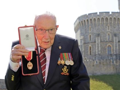 WINDSOR, ENGLAND - JULY 17: Captain Sir Thomas Moore poses after being awarded with the in