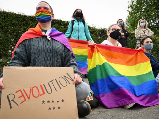 EDINBURGH, SCOTLAND - AUGUST 10: Members of the Scottish Polish community demonstrate outside the Polish Consulate to protest against the arrest of a transgender activist who had carried out acts of civil disobedience against rising homophobia in Poland on August 10, 2020 in Edinburgh,Scotland. (Photo by Jeff J Mitchell/Getty Images)