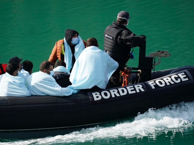 DOVER, ENGLAND - SEPTEMBER 10: The UK Border Force disembark migrants at Dover Marina afte