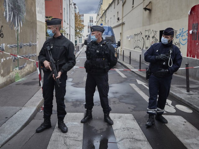 PARIS, FRANCE - SEPTEMBER 25: Armed police secure the area of around the former Charlie Hebdo headquarters, and scene of a previous terrorist attack in 2015, after two people were stabbed on September 25, 2020 in Paris, France. French National Anti-terrorist Prosecutor's office have opened an investigation into the attempted …