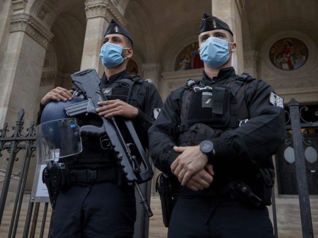 PARIS, FRANCE - OCTOBER 31: Armed French Police stand guard in front of Saint Augustin Church in Paris in the wake of recent terror attacks in France on October 31, 2020 in Paris, France. France ramped up security to 7000 soldiers around schools and places of worship following the fatal …