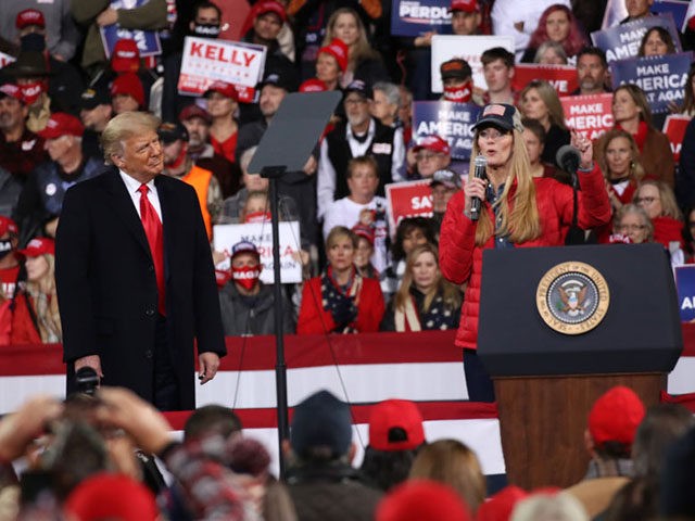 VALDOSTA, GEORGIA - DECEMBER 05: President Donald Trump attends a rally in support of Sen. David Perdue (R-GA) and Sen. Kelly Loeffler (R-GA) on December 05, 2020 in Valdosta, Georgia. The rally with the senators comes ahead of a crucial runoff election for Perdue and Loeffler on January 5th which …