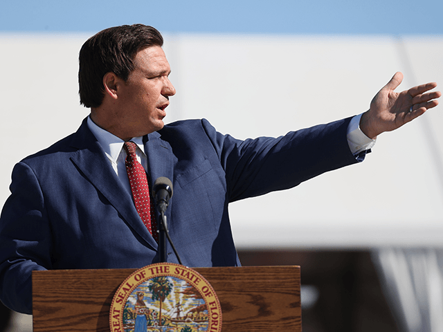 Florida Governor Ron DeSantis speaks during a press conference about the opening of a COVI