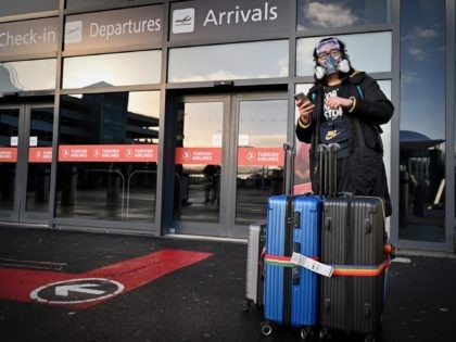 EDINBURGH, SCOTLAND - JANUARY 18: Members of the public are seen at Edinburgh airport as travel corridors close until February 15, on January 18, 2021 in Edinburgh, Scotland. The UK has now closed its so-called "travel corridors" with countries from which arriving travelers were exempt from quarantine requirements. People flying …