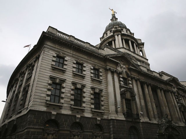 LONDON, ENGLAND - FEBRUARY 16: A statue of the scales of justice stands above the Old Bai