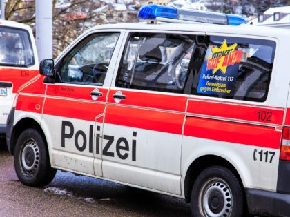 Zurich, Switzerland - 1 February, 2015: a van of Zurich municipal police parked on a slanted street at the Zurich municipal police main office. Zurich municipal police is the third largest police corps in Switzerland, after Zurich and Bern cantonal police corpses.