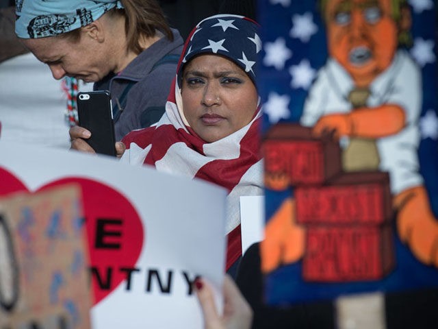 TOPSHOT - Protesters gather in Battery Park and march to the offices of Customs and Border Patrol in Manhattan to protest President Trump's Executive order imposing controls on travelers from Iran, Iraq, Libya, Somalia, Sudan, Syria and Yemen, January 29, 2017 in New York. / AFP / Bryan R. Smith …